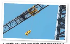  ?? Picture: TIM MARSDEN ?? A large skip and a crane hook fell six metres on to the road at the Chevron Island site.
