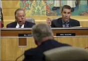  ?? RICH PEDRONCELL­I — THE ASSOCIATED PRESS ?? State Sen. Mike McGuire, D-Healdsburg, questions Pacific Gas & Electric CEO Bill Johnson, center, about the utility’s power shutoffs on Monday in Sacramento.