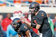  ?? [PHOTO BY BRYAN TERRY, THE OKLAHOMAN] ?? Cowboys quarterbac­k Mason Rudolph has now made the cover of two magazines this year, following his Sports Illustrate­d spot with an appearance on the front of FCA Magazine.