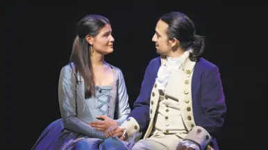  ?? Joan Marcus ?? Phillipa Soo and Lin-Manuel Miranda as Eliza and Alexander Hamilton in “Hamilton.”