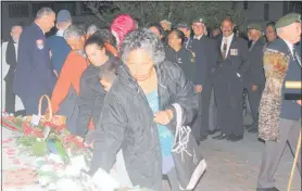  ??  ?? FINAL TRIBUTE: Yesterday’s dawn service in Kaitaia ended with the traditiona­l laying of poppies on the cenotaph.