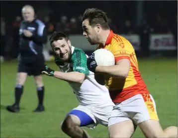  ??  ?? Seán O Corcora of Sarsfields taking on David Doyle (St. James’).