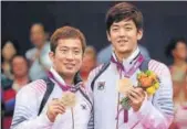  ?? GETTY ?? Chung (left) and partner Lee Yongdae in London 2012.