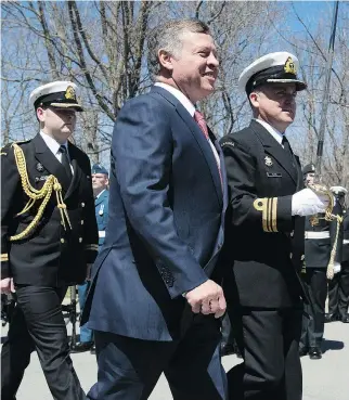  ?? ADRIAN WYLD/THE CANADIAN PRESS ?? Jordan’s King Abdullah inspects the Canadian honour guard during an official welcome to Rideau Hall on Wednesday. Abdullah said the struggle against ISIL will be a lengthy one.