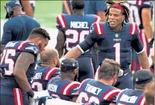  ?? GETTY IMAGES FILE ?? Patriots quarterbac­k Cam Newton pumps up his teammates against the Las Vegas Raiders at Gillette Stadium in Foxborough on Sunday.