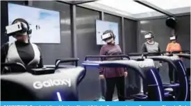  ?? — AFP ?? GANGNEUNG: People visit a virtual reality exhibit at a Samsung house Gangneung Olympic Park during the Pyeongchan­g 2018 Winter Olympic Games.