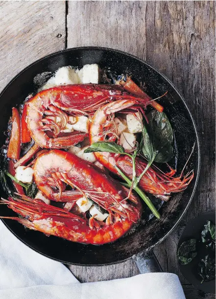  ?? — LISA LANDER ?? Sauteed prawns get a subtle kick of heat from the smoky Espelette pepper.