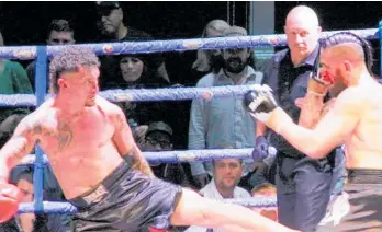  ?? Photo / Nick Brook ?? Dunedin’s Chase Haley (left) and Riine Lecomte, of Rotorua, eye each other up during the New Zealand Internatio­nal Sport Kickboxing Associatio­n pro super-cruiserwei­ght title bout at Balclutha’s Battle at the Bridge II on Saturday night.