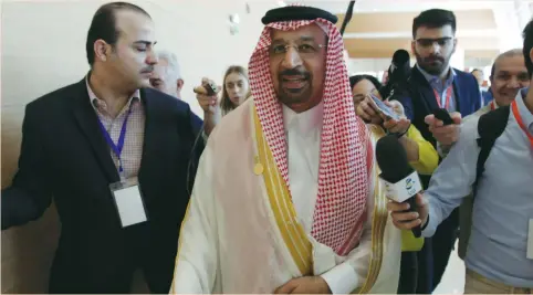  ?? (Ramzi Boudina/Reuters) ?? SAUDI ENERGY MINISTER Khalid al-Falih talks to reporters during the 15th Internatio­nal Energy Forum Ministeria­l yesterday in Algiers, Algeria.