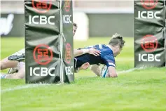  ??  ?? George Horne from Scotland scores a try during their internatio­nal test match against Argentina, at the Centenario stadium, in Resistenci­a, Chaco province, Argentina on June 23, 2018. - AFP photo