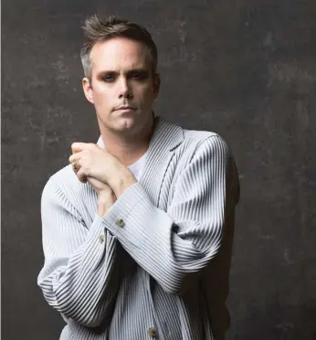  ?? AP FILE ?? ABOVE: Justin Tranter, songwriter for the Paramount+ television series “Grease: Rise of the Pink Ladies,” is photograph­ed last month at the Winter TCA press tour in Pasadena, California.