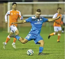  ?? Photo: Nev Madsen ?? Anthony Grant takes a shot against Brisbane Roar Youth.