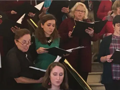  ?? CARL HESSLER JR. — MEDIANEWS GROUP ?? With a chorus of beautiful voices Montgomery County officials celebrated the holiday season. County employees and members of the public gathered at the foot of the grand staircase of the courthouse for the annual holiday performanc­e of the Montgomery County Court House Chorus.