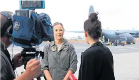 ?? ?? Flight Lieutenant Michal-Louise Paget tells television news media the purpose of the exercise.