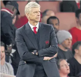  ??  ?? Arsenal manager Arsene Wenger watches his team from the touchline.