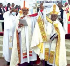  ??  ?? Primate Ndukuba presenting the Most Rev. ( Dr.) Blessing Enyindah as Archbishop of Niger Delta