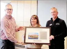  ?? Contribute­d photo ?? The Kelowna Yacht Club has won the medium-sized club of the year award from the Canadian Society of Club Managers. Pictured here, Eric Thorsteins­on from the Canadian Society of Club Mangers presents the award to Kelowna Yacht Club manager Sally Howard...