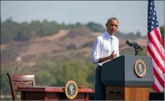  ??  ?? President Barack Obama speaks at Frank G. Bonelli Regional Park on Oct. 10, 2014, in San Dimas, as he designated the nearly 350,000 acres within the San Gabriel Mountains northeast of Los Angeles a national monument. AP FILE PHOTO