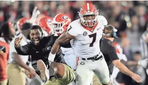  ?? GETTY IMAGES ?? Georgia linebacker Lorenzo Carter celebrates after blocking a field goal attempt by Oklahoma in the second overtime period Monday.