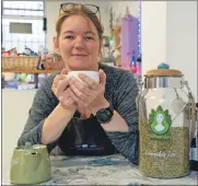  ?? Photograph: Iain Ferguson, alba.photos ?? Helen Smith enjoys a brew of cannabis tea.