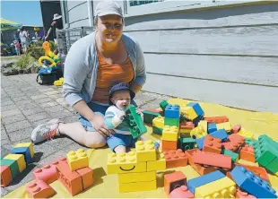  ??  ?? George Langford of Warragul, at just six months old was one of the youngest at the Children’s Expo but kept himself busy including assembling some large building blocks under the guidance of mum Lauren.