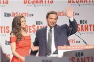  ?? PHELAN M. EBENHACK/ASSOCIATED PRESS ?? Florida Republican gubernator­ial candidate Ron DeSantis, right, waves to supporters with his wife, Casey DeSantis Tuesday in Orlando, Fla.