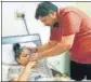  ?? HT PHOTO ?? Meenu Chauhan with her husband at a private hospital in Kurukshetr­a.