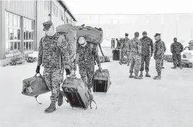  ?? New Alley / AFP / Getty Images ?? About 300 U.S. Marines arrived in Stordal, Norway, on Monday in the latest effort to buttress defenses against a resurgent Russia. This is the first time that foreign troops have been allowed to be stationed in Norway since World War II.