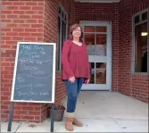  ??  ?? Jan Henry stands in front of her coffee and lunch shop, Caffeine Addicts, in Ringgold. (Catoosa News photo/Tamara Wolk)