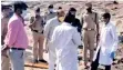  ??  ?? State officials inspecting the blast site