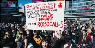  ?? AARON LYNETT / NATIONAL POST ?? Protesters gathered in Toronto in March over what organizers called the National Day of Action Against Election Fraud due to reports of Canadian voters receiving misleading calls.