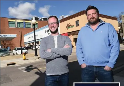  ?? PETER LEE, RECORD STAFF ?? Zac Zehr, left, manager of developmen­t for the Zehr Group, and Brian Prudham, partner at Momentum Developmen­ts, stand across from the proposed condo site.