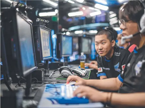  ?? Picture: AFP ?? Members of profession­al eSports team 'Afreeca Freaks' prepare to compete in a 'League of Legends' competitio­n in Seoul, South Korea.