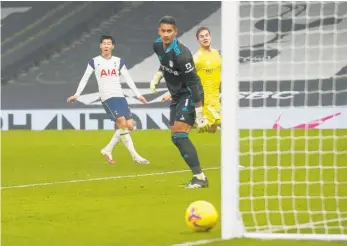  ?? Photo / AP ?? Tottenham’s Son Heung-min, left, reacts after missing a chance to score.