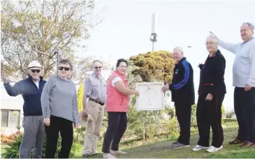  ??  ?? Some of the residents in Victoria and Highclere Sts, Warragul, are questionin­g why a new 26.3 metre high mobile communicat­ions tower and six antenna should be built in Victoria St and will lodge objections to a planning applicatio­n before Baw Baw shire council. Some of them were on the proposed site last week, from left, Ross Dawson, Anthea Dacy, Reg and Judy Dixon, Geoff and Barbara Willingham and Rob Sinnett say the tower will dwarf current antennas on a light pole (at rear) the new facility will supersede.