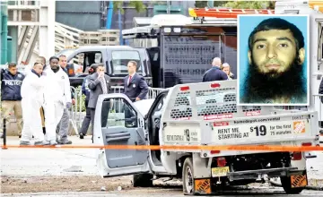  ?? — Reuters photo ?? Law enforcemen­t officials investigat­e a pickup truck used in an attack on the West Side Highway in lower Manhattan in New York City, US. (Inset) Saipov.