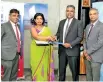  ?? ?? From Left to Right Jayantha Kalinga (COO – LOLC Life Assuarance Ltd),
Nadika Opatha (Director/CEO LOLC Life Assuarance Ltd), Niranjan Thangaraja­h (ACEO – SDB bank), Shanka Abeywarden­e
(CFO - SDB bank)