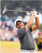  ?? PETER MORRISON/ASSOCIATED PRESS ?? Francesco Molinari plays through the rough during Sunday’s final round of the British Open. Molinari became the first Italian to win a major championsh­ip.