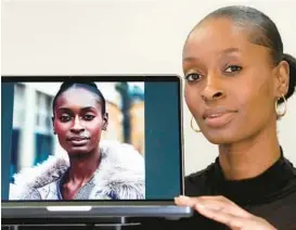  ?? KIRSTY WIGGLESWOR­TH/AP ?? Fashion model Alexsandra­h is seen next to a computer displaying an AI-generated image of herself March 29 in London.