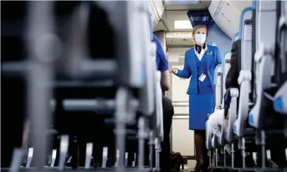  ?? Photograph: Hollandse Hoogte/REX/Shuttersto­ck ?? Airline crews have been managing more disruptive behavior than usual since the pandemic restrictio­ns have eased.