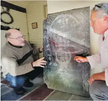  ??  ?? Walter Skold, left, and gravestone carver Michael Updike, son of novelist John Updike, discuss the design of Skold’s tombstone last month. Skold suffered a heart attack and died last weekend. He drew inspiratio­n for his own tombstone from his visits to...