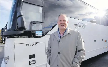  ?? ADRIAN LAM, TIMES COLONIST ?? John Wilson, president and CEO of Wilson’s Transporta­tion, said he is expanding service into the Lower Mainland to cover the routes that Greyhound will abandon on Wednesday.