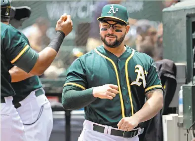  ?? Michael Macor / The Chronicle ?? The A’s Yonder Alonso was 7 when his family fled Cuba in the middle of the night in 1995.