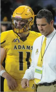  ?? KEN SWART - FOR MEDIANEWS GROUP ?? Parker Picot (11) will return at quarterbac­k in the 2022 season for Rochester Adams head coach Tony Pattrito (right).