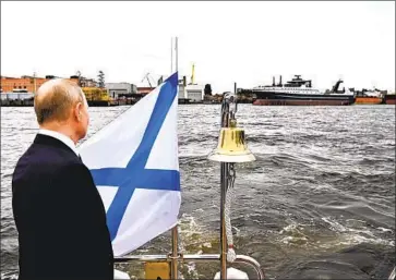  ?? RUSSIAN PRESIDENT Kremlin ?? Vladimir Putin at a launch event for a supertrawl­er last year in St. Petersburg. Shortcomin­gs in import rules mean Russian-caught seafood will probably get into the U.S. by way of China.