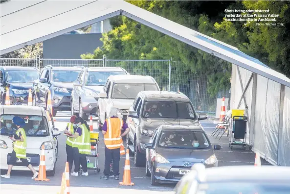  ?? Photo / Michael Craig ?? Shots being administer­ed yesterday at the Wairau Valley vaccinatio­n site in Auckland.