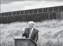  ??  ?? LONE STAR STATEMENT: Donald Trump speaks in front of an unfinished part of his border wall Wednesday in Pharr, Texas.