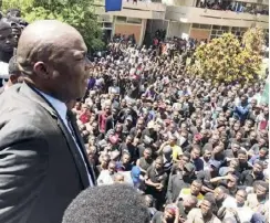  ??  ?? Mr Lusambo addressing UNZA students