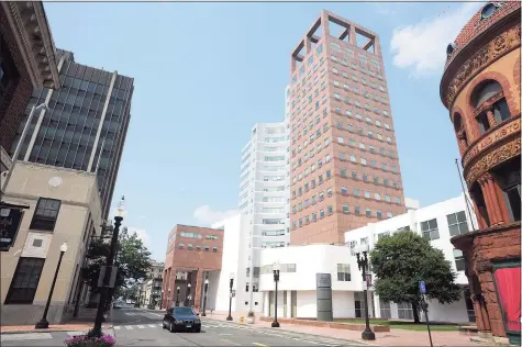  ?? Ned Gerard / Hearst Connecticu­t Media ?? The view looking north up Main Street of Peoples United Bank’s headquarte­rs in Bridgeport on Monday.