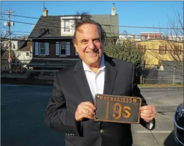  ?? SUBMITTED PHOTO ?? State Sen. Andy Dinniman, D-19, displays a historic Pennsylvan­ia Senate license plate from 1933 that he received as a holiday gift.